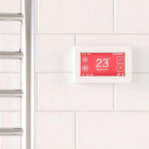 TS Dual - Moderner THERMOSPHERE Raumthermostat mit Touch-Control | Radiamo